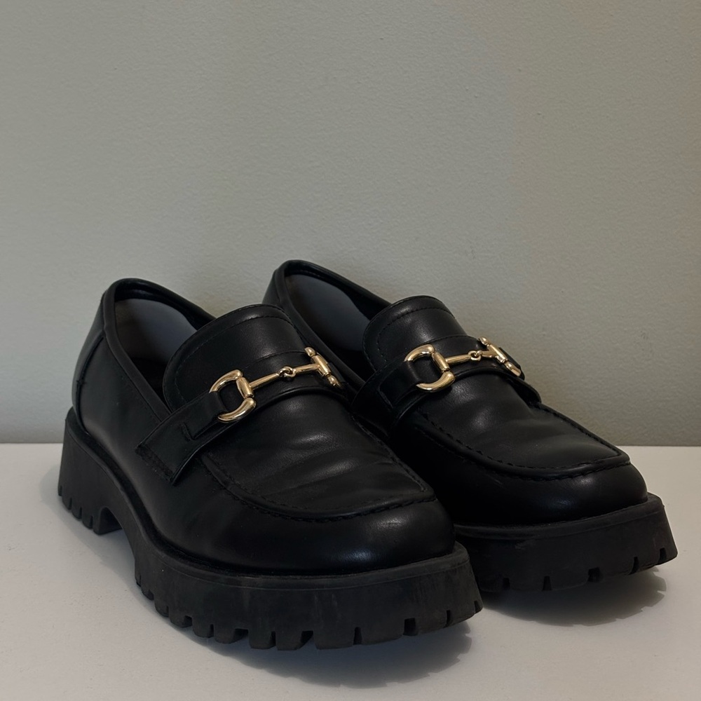 Elegant Black Loafers with Gold Accent